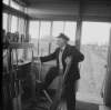 [J. Hannigan operating the signal levers in Sallins North signal box, Sallins, Co. Kildare]