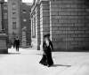 [Woman entering the National Library of Ireland, Kildare Street]