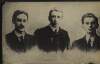 [A head and shoulders photograph of three men, unidentified],