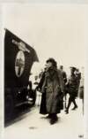 [Constance Markievicz walking to ambulance under guard after her surrender]